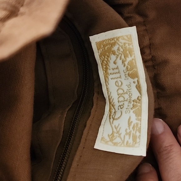 Multi coloured straw bag with drawstring top. inside zip privacy pocket - Picture 8 of 10